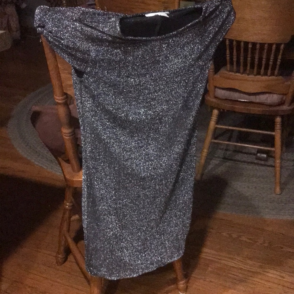 Cute black shimmering dress.